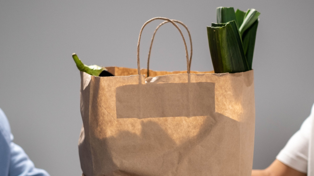 A paper bag filled with food - a growing concern during the cost of living crisis